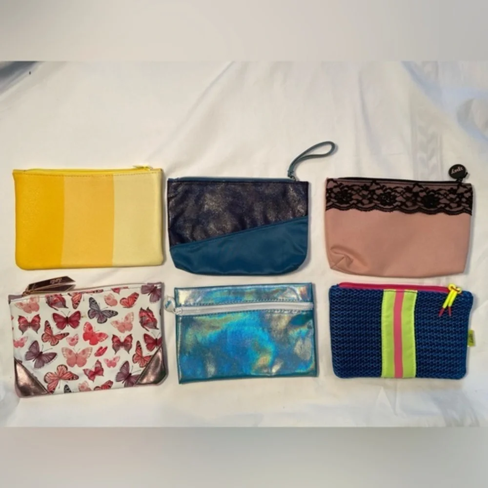 Ipsy, pouches with zipper, like new, price is for all 6 items‎